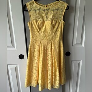 Yellow lacy dress with a yellow lining.
